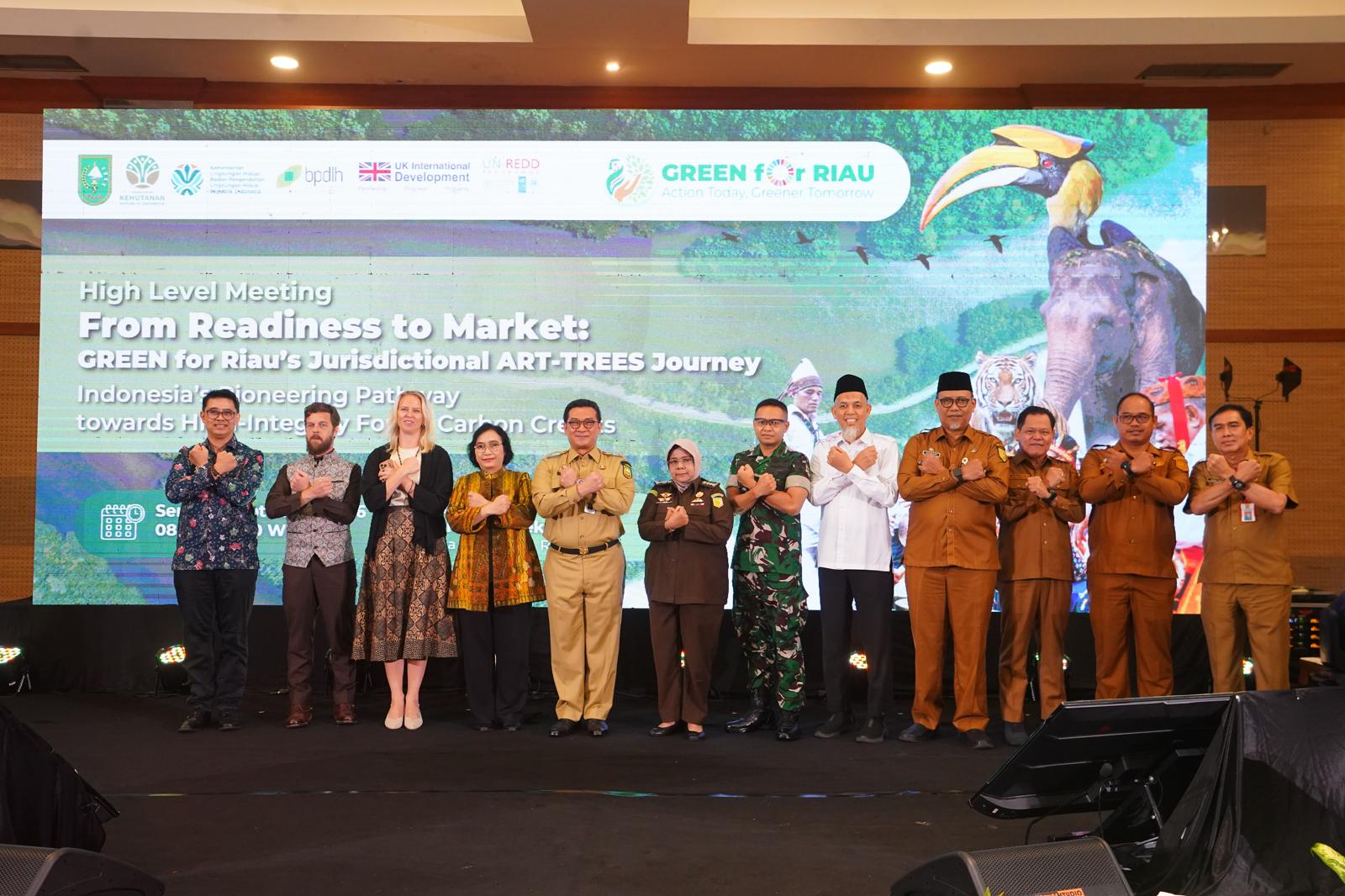 Officials and development partners at the GREEN for Riau high-level meeting in Pekanbaru.